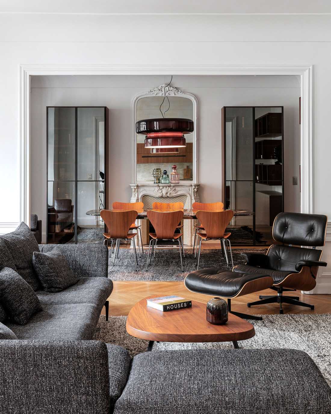 Interior design of a city apartment with designer furniture and lighting